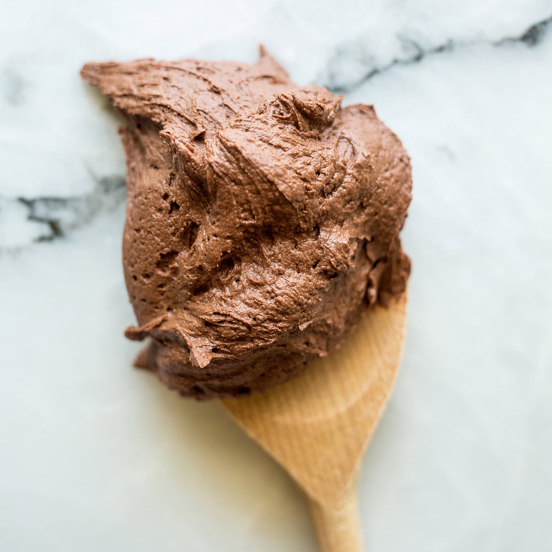 My Dark Chocolate Buttercream recipe is ultra rich, silky, and smooth with intense chocolate flavor and just the perfect amount of sweetness. Amazing on any cake or cupcake!