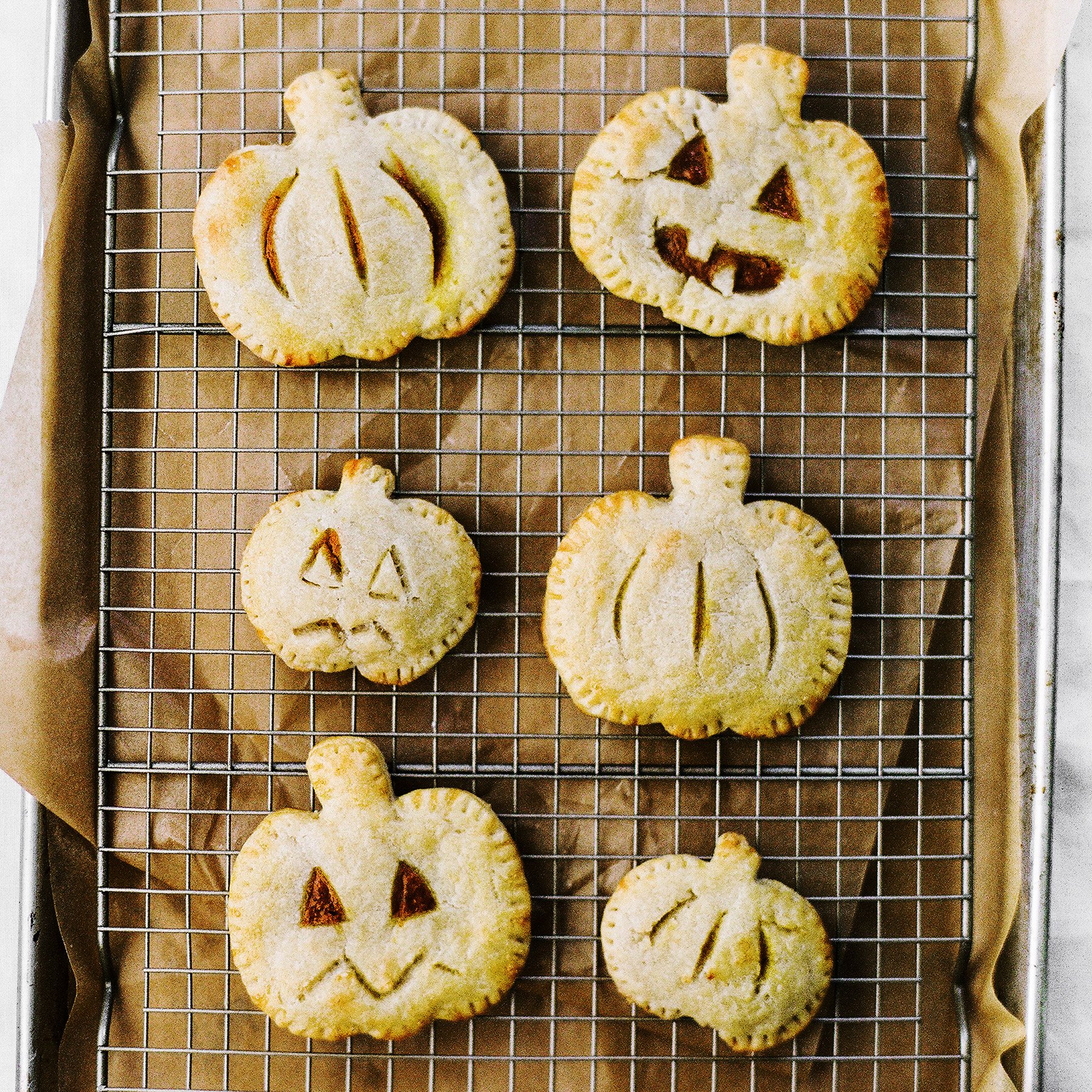 small pumpkin-shaped pies with pumpkin spiced filling, perfect for Halloween