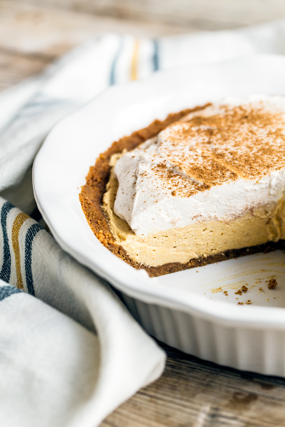 photo looking inside the No Bake Pumpkin Mousse Pie in its pan, showing the depth and texture of this pie's filling.